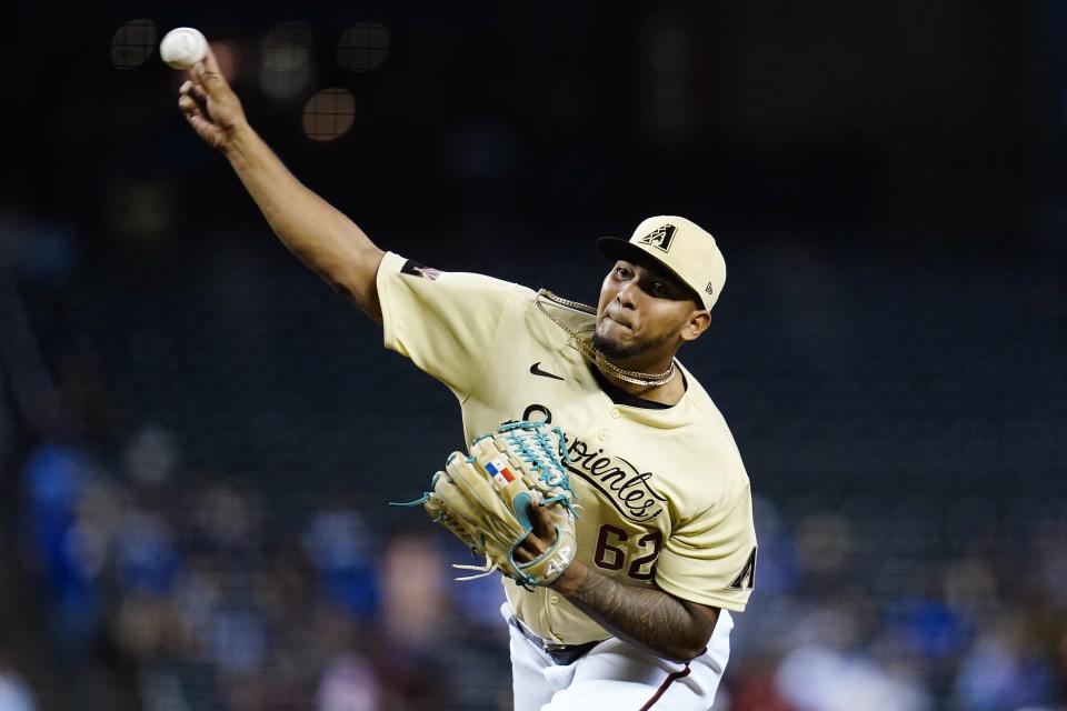 Arizona Diamondbacks starting pitcher Humberto Mejia throws against the Los Angeles Dodgers during the first inning of a baseball game Sunday, Sept. 26, 2021, in Phoenix. (AP Photo/Ross D. Franklin)