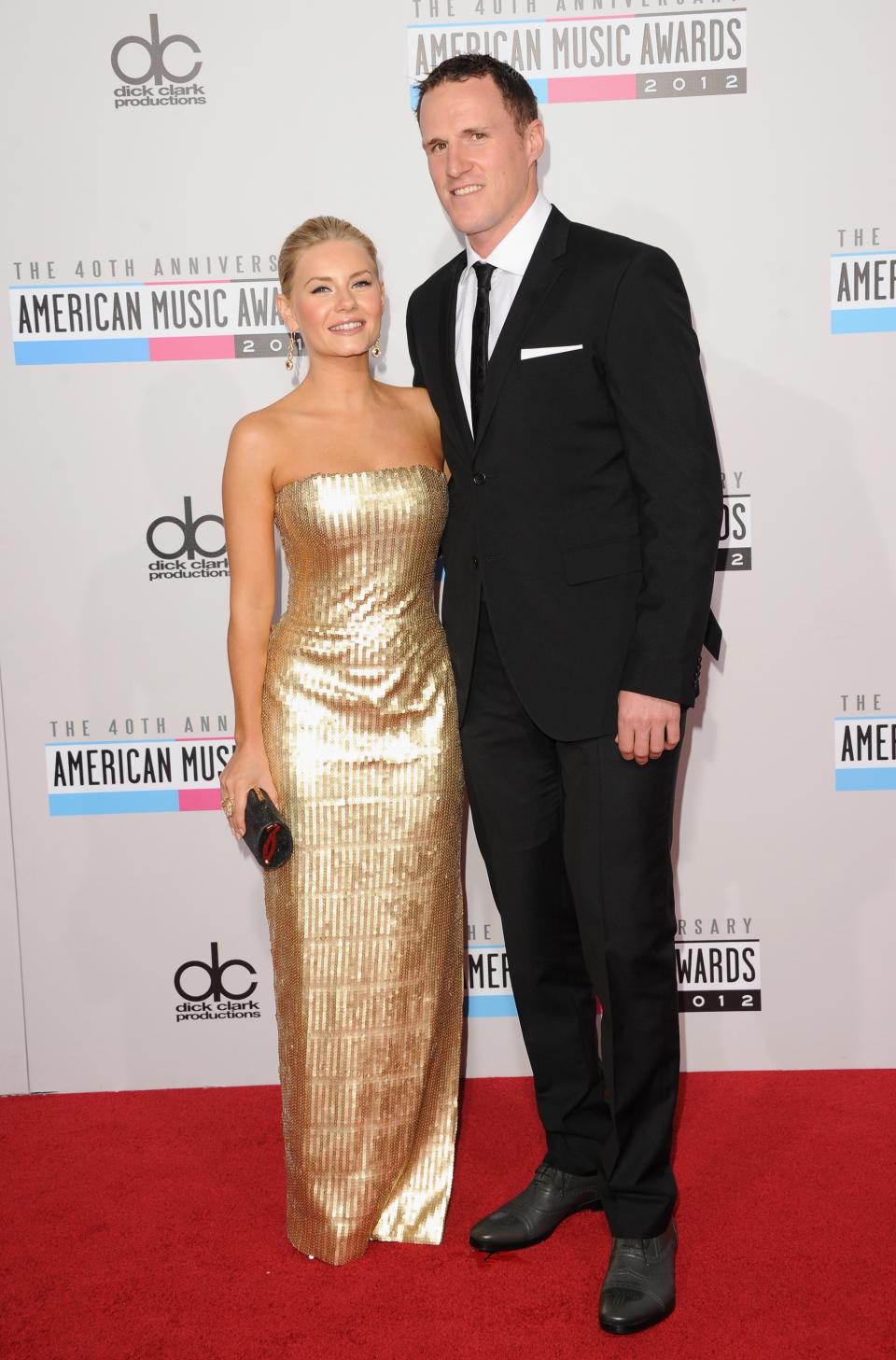 LOS ANGELES, CA - NOVEMBER 18: Actress Elisha Cuthbert and athlete Dion Phaneuf attend the 40th American Music Awards held at Nokia Theatre L.A. Live on November 18, 2012 in Los Angeles, California. (Photo by Jason Merritt/Getty Images)