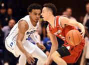 Dec 5, 2018; Durham, NC, USA; Hartford Hawks guard D.J. Mitchell (25) looks to pass as Duke Blue Devils guard Tre Jones (3) defends during the second half at Cameron Indoor Stadium. Mandatory Credit: Rob Kinnan-USA TODAY Sports