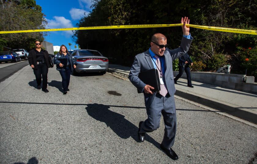 Beverly Hills, CA - January 28: LAPD officers investigate on 2700 block of Ellison Drive near the corner of Arby Dr on Saturday, Jan. 28, 2023, in Beverly Hills, CA. The street is blocked off due to a police investigation. Police are investigating a shooting that occurred today in the Beverly Crest area of Los Angeles, bordering Beverly Hills, where allegedly three people were killed and four others were critically wounded. The initial dispatch was an ``assault with a deadly weapon call" in the 2700 block of Ellison Drive about 2:40 a.m., the Los Angeles Police Department's Media Relations Division reported. (Francine Orr / Los Angeles Times)