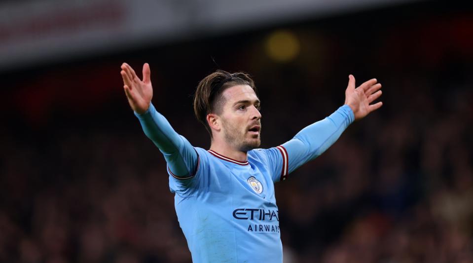   Jack Grealish of Manchester City celebrates after scoring his team's second goal during the Premier League match between Arsenal and Manchester City at the Emirates Stadium on February 15, 2023 in London, United Kingdom. 