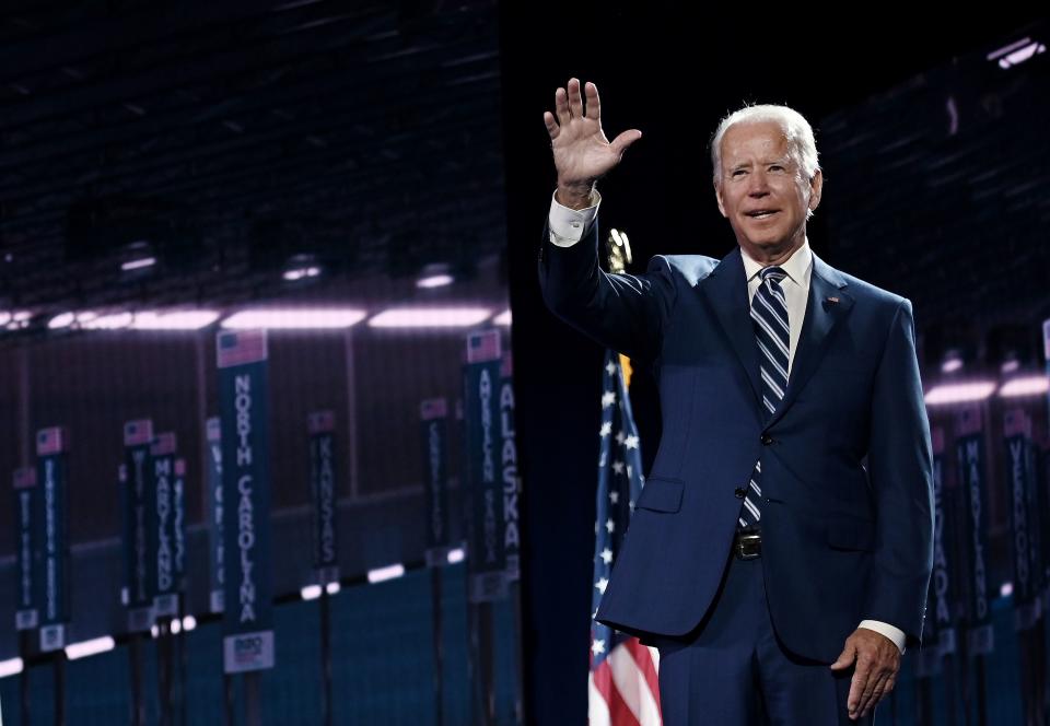 Former vice-president and Democratic presidential nominee Joe Biden waves on stage at the end of the third day of the Democratic National Convention, being held virtually amid the novel coronavirus pandemic, at the Chase Center in Wilmington, Delaware on August 19, 2020. (Photo by Olivier DOULIERY / AFP) (Photo by OLIVIER DOULIERY/AFP via Getty Images)