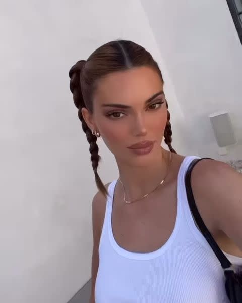 <p>Proving you're never too old for pigtails, Kendall's adorable centre-parted plaits are perfect for summer.</p><p><a href="https://www.instagram.com/p/Ccgr0mIPF_h/" rel="nofollow noopener" target="_blank" data-ylk="slk:See the original post on Instagram;elm:context_link;itc:0;sec:content-canvas" class="link ">See the original post on Instagram</a></p>