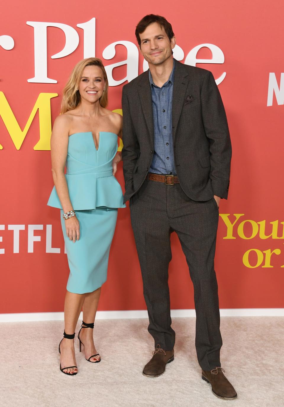 Reese Witherspoon and Ashton Kutcher attend the world premiere Of Netflix's "Your Place Or Mine" at Regency Village Theatre on Feb. 2, 2023, in Los Angeles.