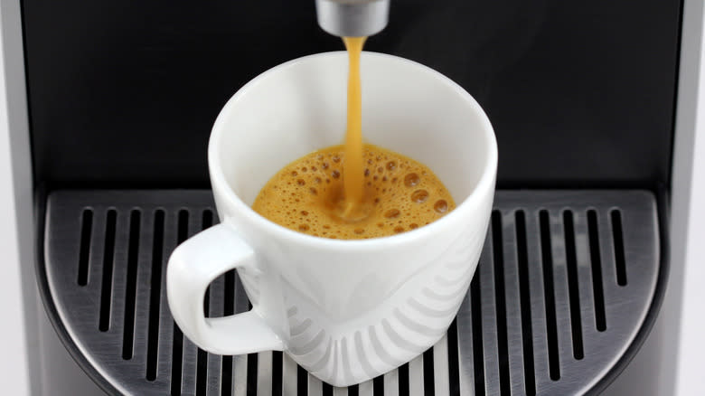 Nespresso pouring double shot of espresso