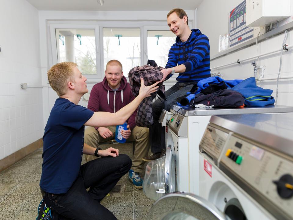 Students doing laundry.