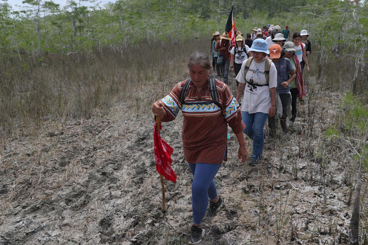 Betty Osceola, seen here leading a hike through Big Cypress National Preserve in April 2021, feels the Suni Sands mound is sacred and should never be disturbed.