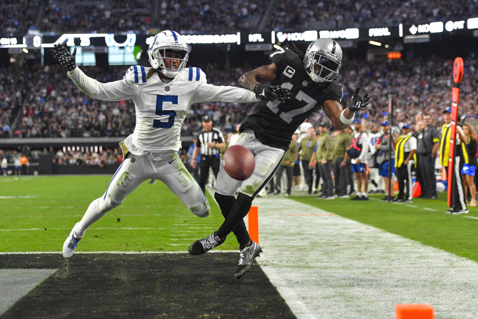 Indianapolis Colts cornerback Stephon Gilmore (5) breaks up a pass intended for Las Vegas Raiders wide receiver Davante Adams (17) in the final minute of the second half of an NFL football game, Sunday, Nov. 13, 2022 in Las Vegas. The Colts defeated the Raiders 25-20. (AP Photo/David Becker)