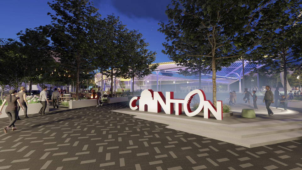 This rendering provided by MKSK shows the design planned for the NFL dedicated Centennial Plaza in downtown Canton, Ohio. Centennial Plaza, developed with the help of $12 million in funding from the citizens and businesses of Canton, will occupy a two-acre city block formerly known as Market Square. (Courtesy of MKSK/Pro Football Hall of Fame via AP)