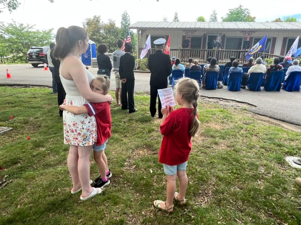 (Left) Hanna McFalls, 15, watches the Memorial Day ceremony with Regan McFalls, 7, and Paisley Johnson, 6, at Pinecrest Memorial Gardens in Columbia on Monday, May 29, 2023. Retired U.S. Army Col. Scott Gaines served as the keynote speaker.