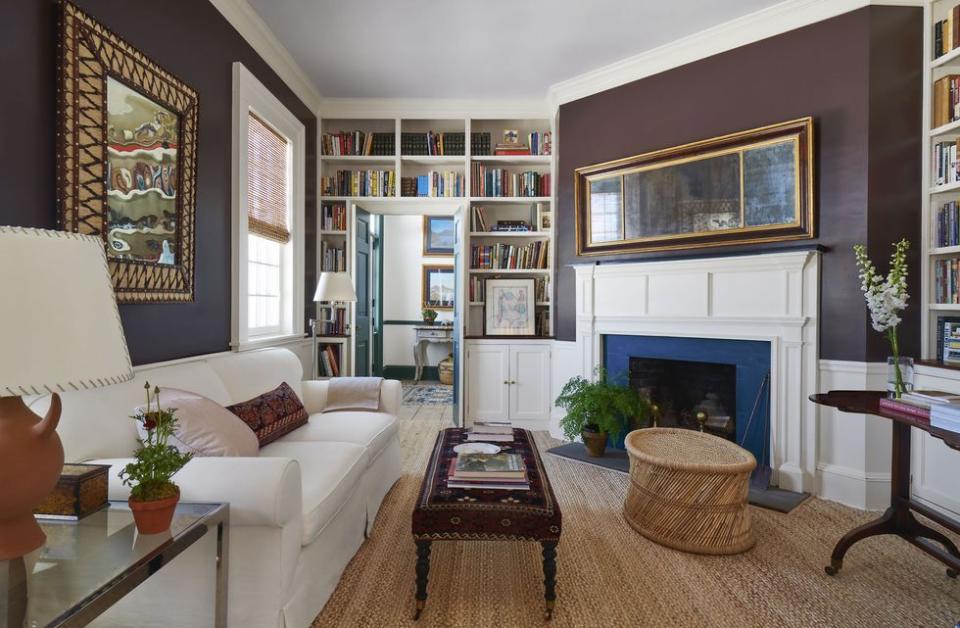 a living room with a fireplace