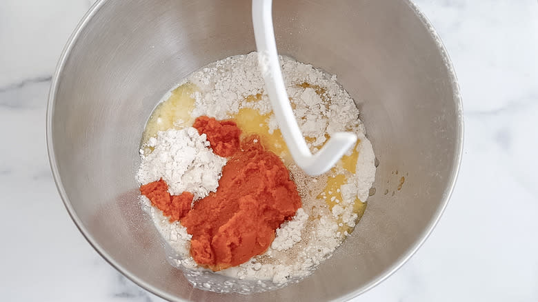 pumpkin donut dough ingredients in stand mixer