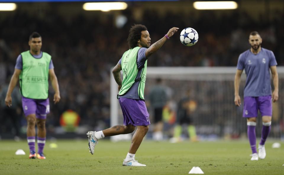 <p>Real Madrid’s Marcelo warm up before the match </p>