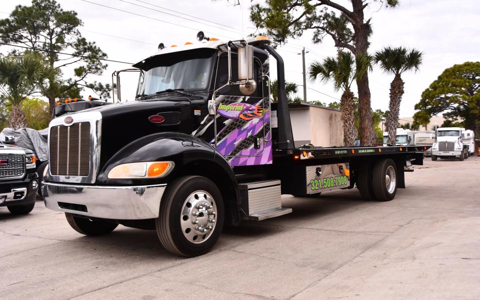 An Imperial Towing truck heads out of the lot for a tow. Operators are requesting to meet with commissioners to discuss a possible increase.