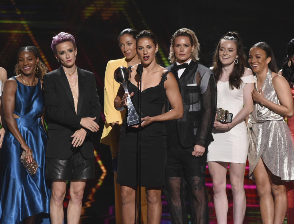 Carli Lloyd, center, and members of the U.S. women's national soccer team accept the award for best team at the ESPY Awards on Wednesday, July 10, 2019, at the Microsoft Theater in Los Angeles. (Photo by Chris Pizzello/Invision/AP)