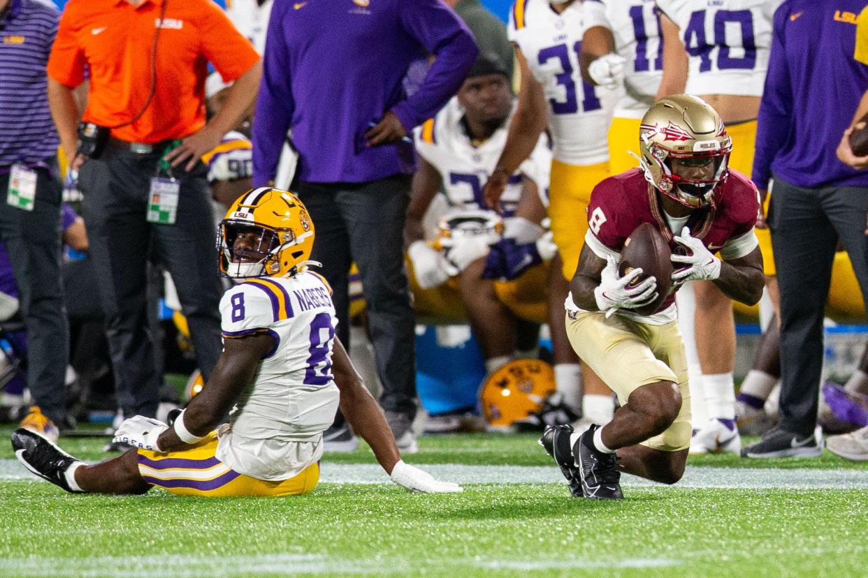 Florida State Seminoles defensive back Renardo Green (8) intercepts the ball during a game against the LSU Tigers at Camping World Stadium on Sunday, Sept. 3, 2023.