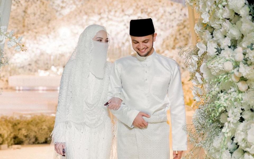 The newlyweds came under the spotlight after photos of alleged SOP breaches at their wedding went viral. — Picture via Instagram/neelofa