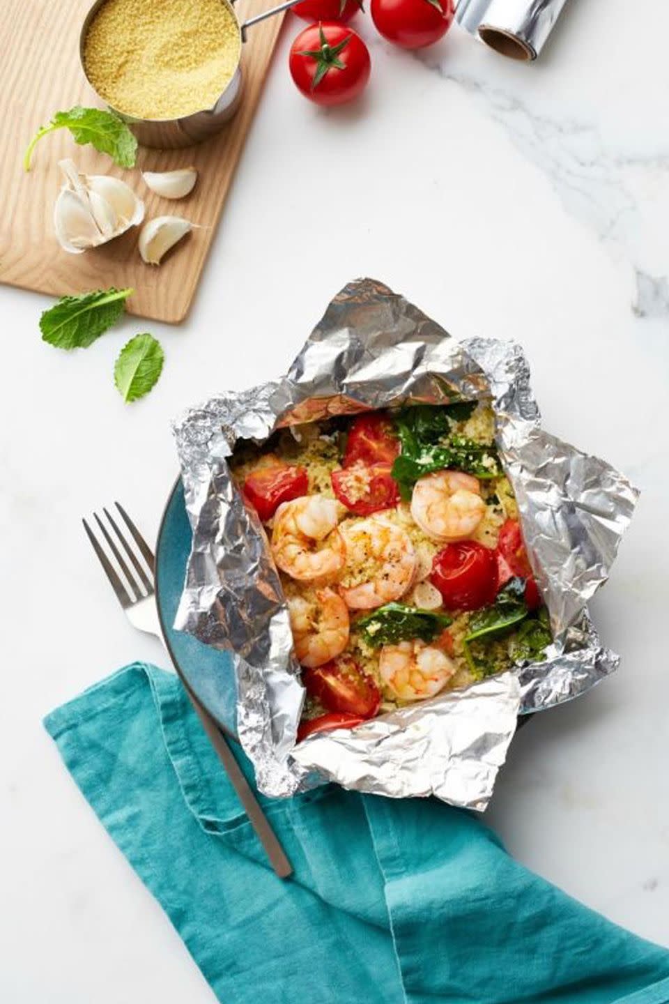 Shrimp and Garlicky Tomatoes with Kale Couscous