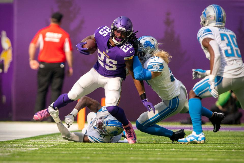 Vikings running back Alexander Mattison is tackled by Lions defenders in October. Mattison excelled the last time he faced the Lions and could have another big game if Dalvin Cook can't suit up in Week 13.