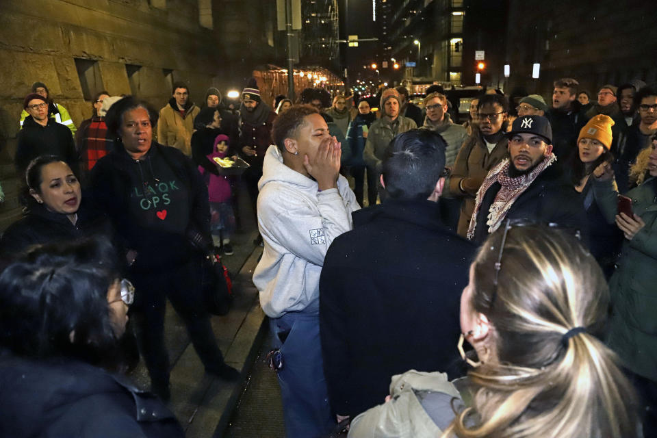 Supporters of Antwon Rose II, gather outside the Allegheny County Courthouse after hearing the verdict of not guilty on all charges for Michael Rosfeld, a former police officer in East Pittsburgh, Pa., Friday, March 22, 2019. Rosfeld was charged with homicide in the fatal shooting of Antwon Rose II as he fled during a traffic stop on June 19, 2018. (AP Photo/Gene J. Puskar)