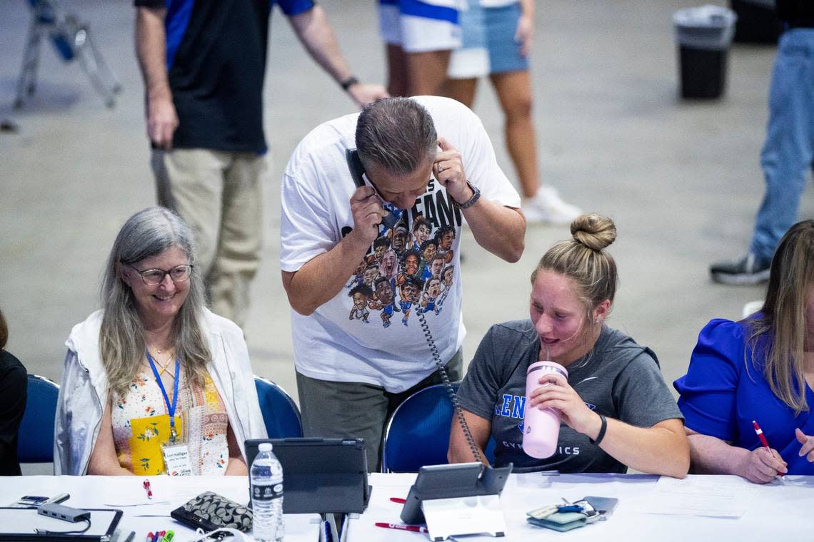 John Calipari works the phones during an open practice and telethon to raise money for flood relief. Silas Walker/2022 staff file photo