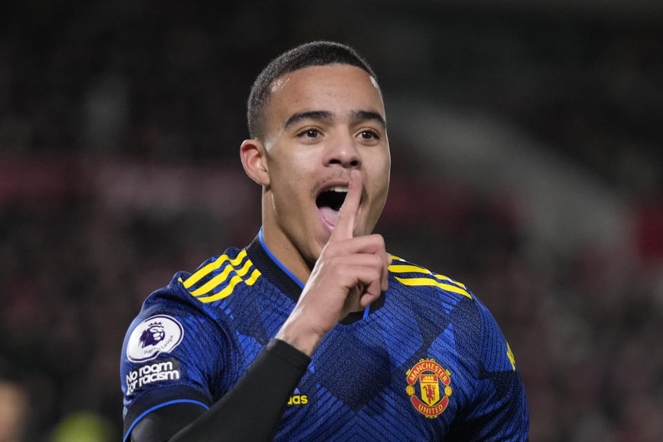 FILE - Manchester United's Mason Greenwood celebrates after scoring his side's second goal during an English Premier League soccer match between Brentford and Manchester United at the Brentford Community Stadium in London, Jan. 19, 2022. Manchester United forward Mason Greenwood will no longer face charges of attempted rape and assault, the Crown Prosecution Service said on Thursday Feb. 2, 2023. (AP Photo/Matt Dunham, File)