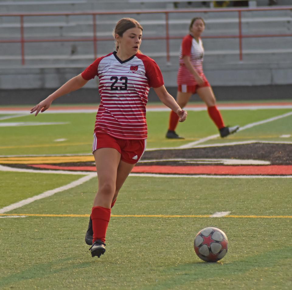 Coldwater defender Hannah Stevens (23) looks to clear the ball near midfield versus Lumen Christi on Wednesday.