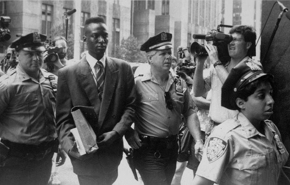 Yusef Salaam, escorted by police, in an archive photo.