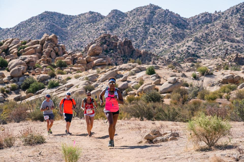 Participants in the John Wayne Grit Series run through Pioneertown Mountains Reserve. Proceeds from the races go towards funding the John Wayne Cancer Foundation.