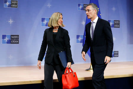 European Union foreign policy chief Federica Mogherini and NATO Secretary-General Jens Stoltenberg leave a joint news conference during a NATO foreign ministers meeting at the Alliance headquarters in Brussels, Belgium, December 6, 2016. REUTERS/Francois Lenoir