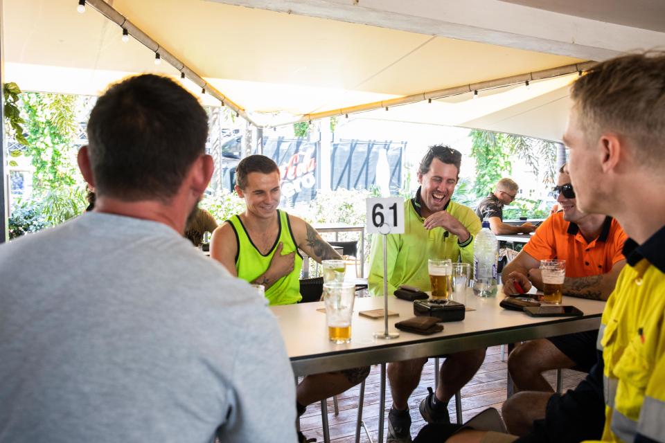 Friends drinking beer at the Cavenaugh Hotel in Darwin after coronavirus restrictions eased. Source: AAP