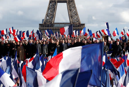 Francois Fillon, former French prime minister, member of The Republicans political party and 2017 presidential election candidate of the French centre-right, attends a meeting at the Trocadero square across from the Eiffel Tower in Paris, France, March 5, 2017. REUTERS/Philippe Wojazer