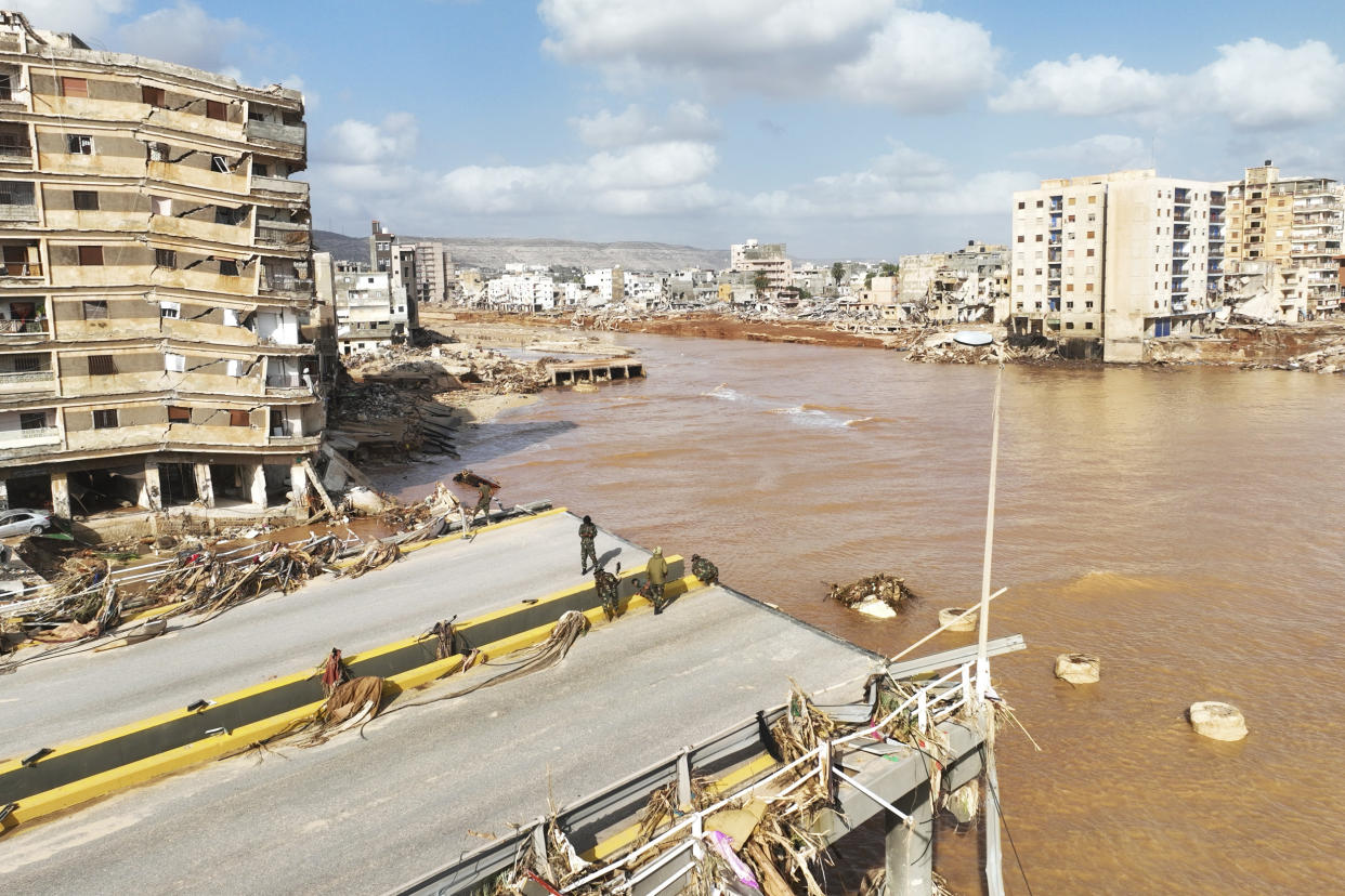 The rainwater that gushed down Derna's mountainside and into the city has killed thousands and left thousands more missing, washing entire neighborhoods out to sea.  (Jamal Alkomaty / AP)
