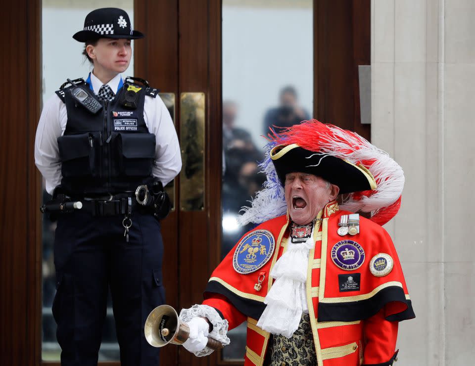 Town Crier Tony Appleton announces the birth of a baby boy outside St Mary's Hospital in London. Source: AAP