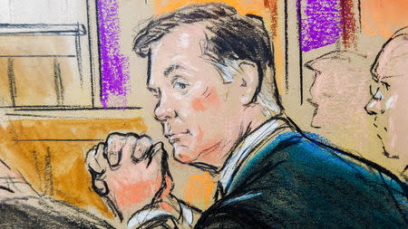 Former Trump campaign manager Paul Manafort is shown in a court room sketch, as he sits in federal court on the opening day of his trial on bank and tax fraud charges stemming from Special Counsel Robert Mueller's investigation into Russian meddling in the 2016 U.S. presidential election, in Alexandria, Virginia. REUTERS/Bill Hennessy