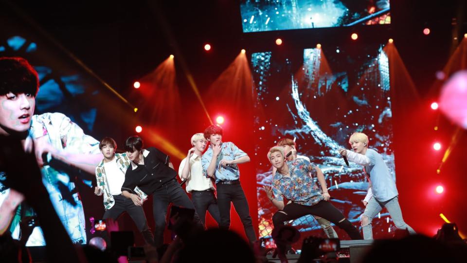 BTS shows off some of its choreography on stage at the Rose Bowl in Pasadena.