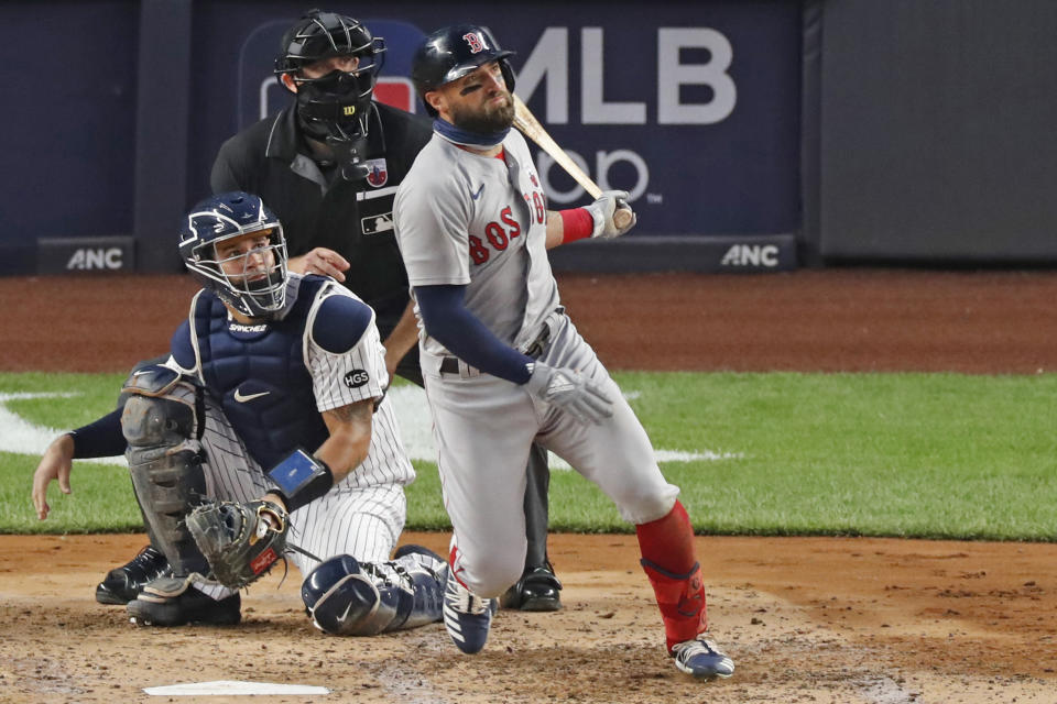 Boston Red Sox's Kevin Pillar, right, and New York Yankees catcher Gary Sanchez watch Pillar's third-inning solo home run in a baseball game Sunday, Aug. 16, 2020, in New York. (AP Photo/Kathy Willens)