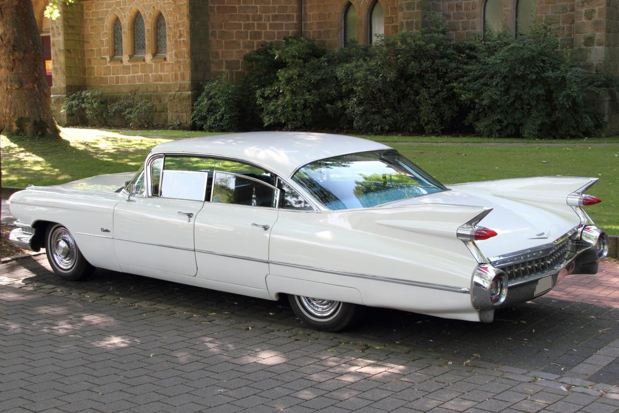 1959 cadillac sedan deville parked outside on street