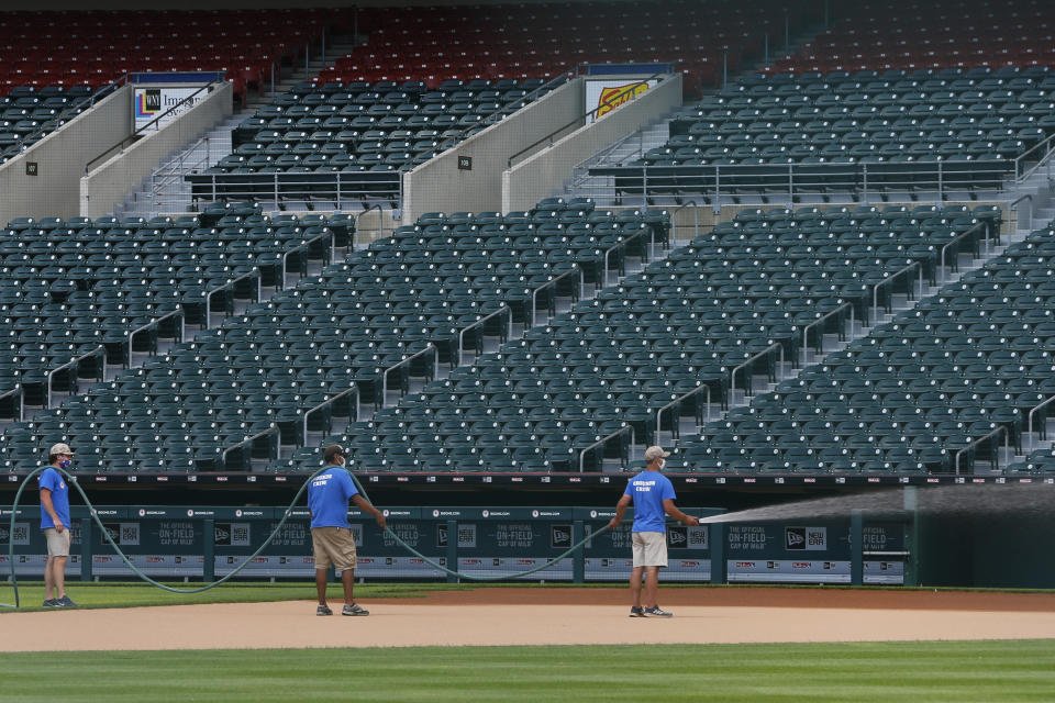 Grounds crew work on field following the announcement that the Toronto Blue Jays will play their 2020 home games at Sahlen Field, their Triple-A affiliate, Friday, July 24, 2020, in Buffalo N.Y. (AP Photo/Jeffrey T. Barnes)