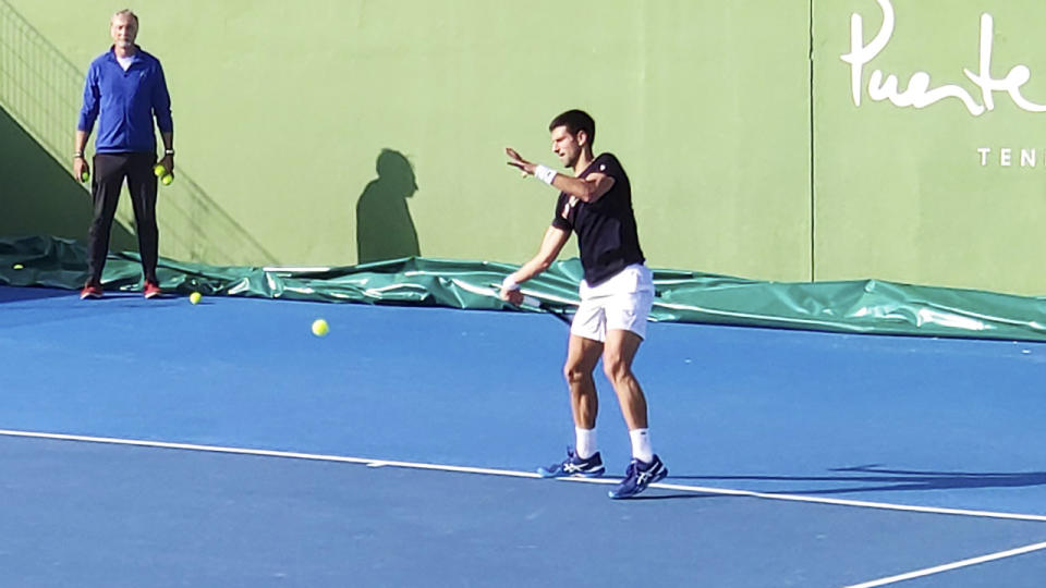 Novak Djokovic, pictured here training on a tennis court in Marbella, Spain.