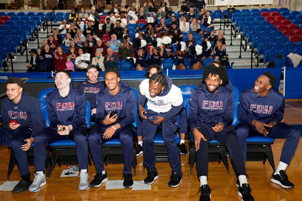 Members of the Fairleigh Dickinson University Basketball team are shown in the Rothman Center, in Teaneck as they await to see who they will play in the NCAA Basketball Tournament. Shown left to right is, Grant Singleton, Brayden Reynolds, Cam Tweedy, Demetre Roberts, Ansley Almonor and Joe Munden. Sunday, March 12, 2023; Teaneck, New Jersey, United States;  