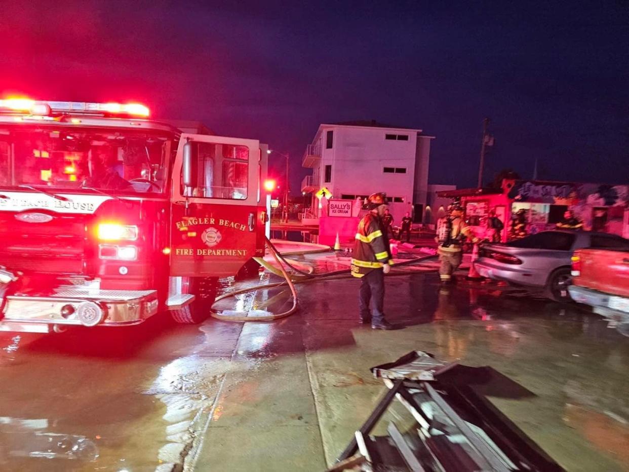 Flagler Beach firefighters work a commercial structure fire at 403 N. Ocean Shore Blvd. early on Saturday morning. The fire heavily damaged Atlantic RV & Auto Serices, Inc., officials said.