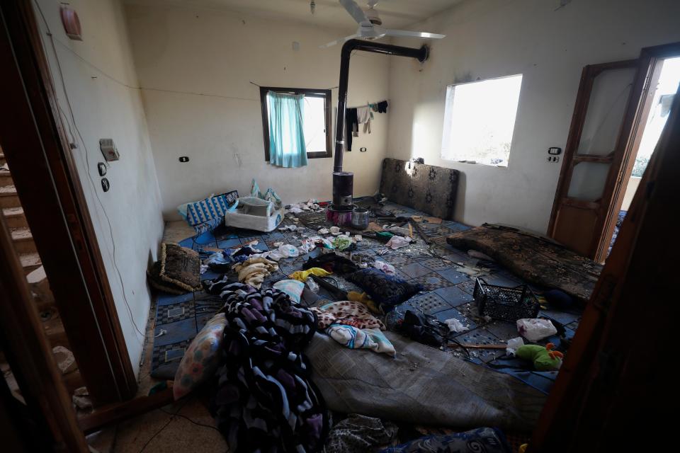 A damaged room and windows are seen inside a house after an operation by the U.S. military in the Syrian village of Atmeh in Idlib province, Syria, Thursday, Feb. 3, 2022 (AP)