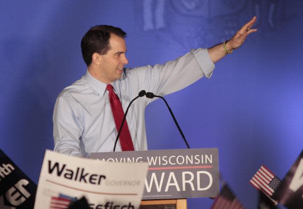 Gov. Scott Walker celebrates his victory. (REUTERS/Darren Hauck)