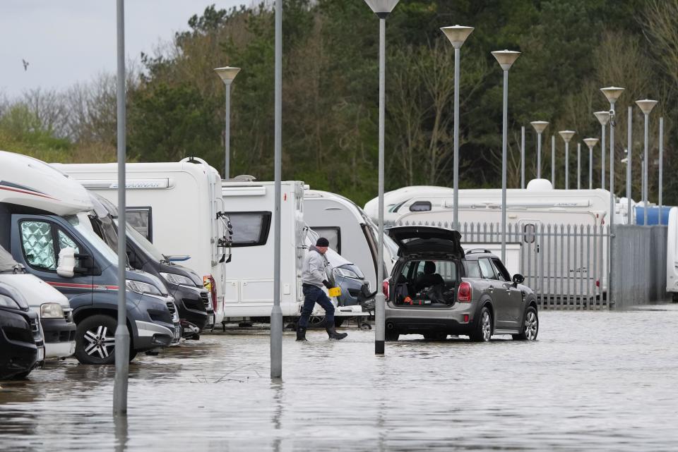 Flooding near a caravan self-storage site near Rope Walk in Littlehampton, West Sussex, after the River Arun burst its banks overnight. West Sussex Fire and Rescue Service warned people in Littlehampton of severe floodwaters in the wake of Storm Kathleen. Picture date: Tuesday April 9, 2024.