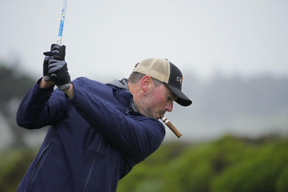 Eric Church hit from the 13th tee of the Monterey Peninsula Country Club Shore Course during the second round of the AT&T Pebble Beach Pro-Am golf tournament in Pebble Beach, Calif., Friday, Feb. 3, 2023. (AP Photo/Godofredo A. Vásquez)