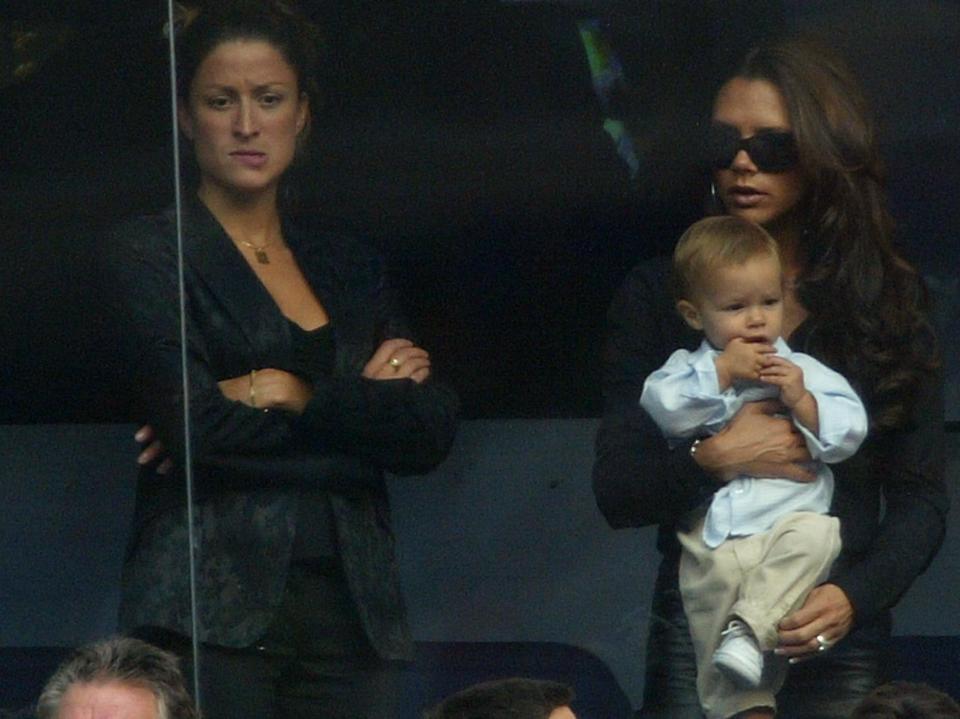 Left to right: Rebecca Loos with  Victoria Beckham at a Real Madrid match in 2003.