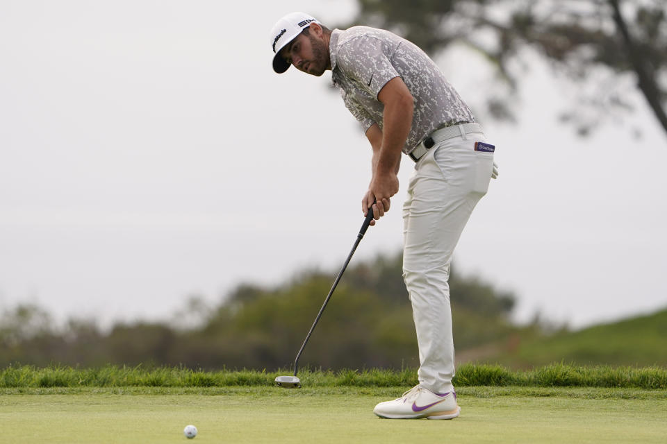 Matthew Wolff putts on the 14th green during the second round of the U.S. Open Golf Championship, Friday, June 18, 2021, at Torrey Pines Golf Course in San Diego. (AP Photo/Jae C. Hong)
