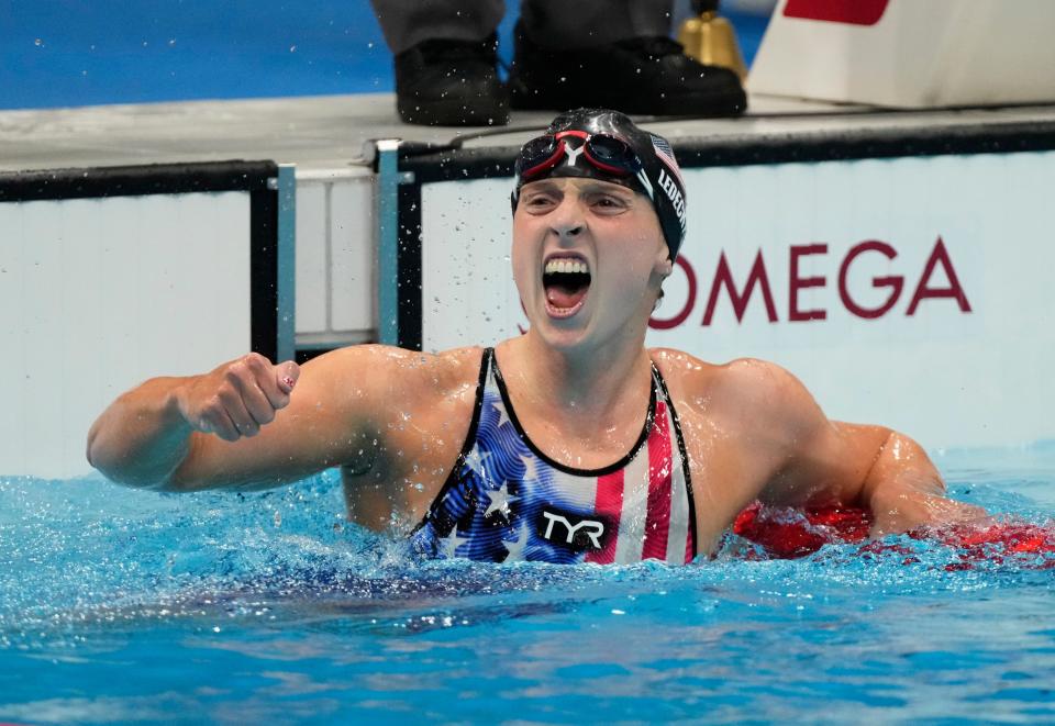 Katie Ledecky celebrates after winning the women's 1500m freestyle final during the Tokyo 2020 Olympic Summer Games..