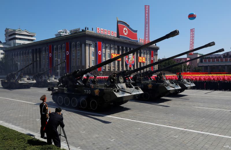 FILE PHOTO: Self propelled artillery roll pass during a military parade marking the 70th anniversary of North Korea's foundation in Pyongyang